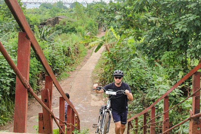Half Day Ha Noi Tour by E-bike - What you get for $99: guide, e-bike, helmet, rain gear, lunch