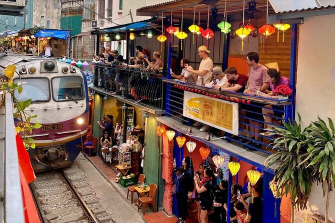 Half-Day Hanoi Highlights and Train Street Experience - Stop 2: Ho Chi Minh Complex, photos and the human story