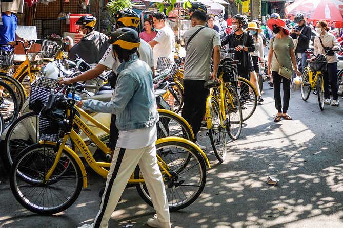 Half Day - Saigon Off-the-Beaten-Path - City Cycling Tour - District 10’s slower pace, the Umbrella Market area, and 1968 apartments