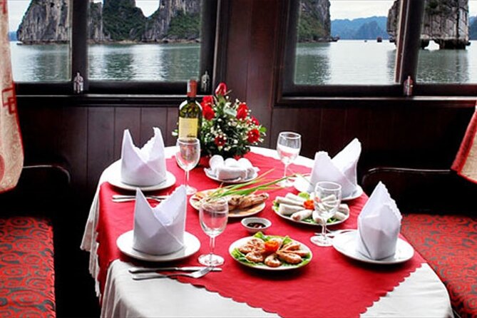Halong 6 hours Boat tour with Cave, Kayak, lunch, transfer high-way from Hanoi - Price and What You Get for $14.40