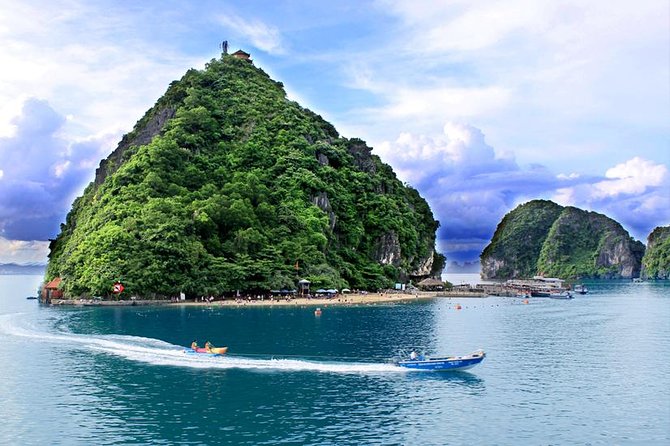 Halong 6 hours Boat tour with Cave, Kayak, lunch, transfer high-way from Hanoi - Cruise Port Start, Lunch, and Halong’s Signature Rock