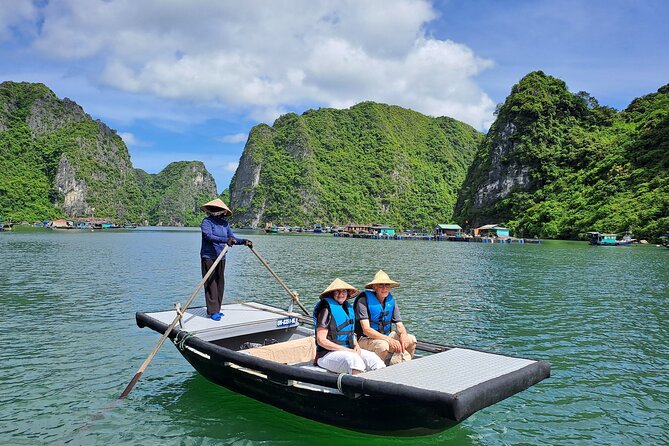 Halong & Bai Tu Long Luxury Day Tour - Fishing village & Kayak - Thien Canh Son Cave, karst details plus sea-fisherman connections