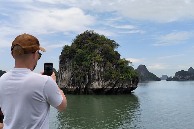 Halong & Bai Tu Long Luxury Day Tour - Fishing village & Kayak - Cruising Bai Tu Long Bay, where the scenery does most of the work