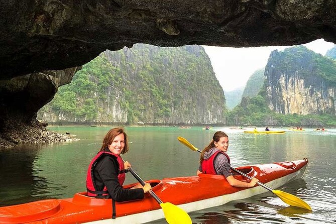 Halong Bay day tour 4 hours Cruise from Hanoi city - Ba Hang Fishing Village: Bamboo Boat or Kayak in the Cave Area