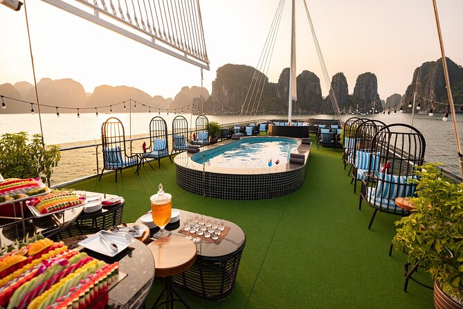 Halong Bay Day Tour With Sunlight Luxury Cruise With Transfer - Your Halong Bay day route: caves, islands, and kayaking