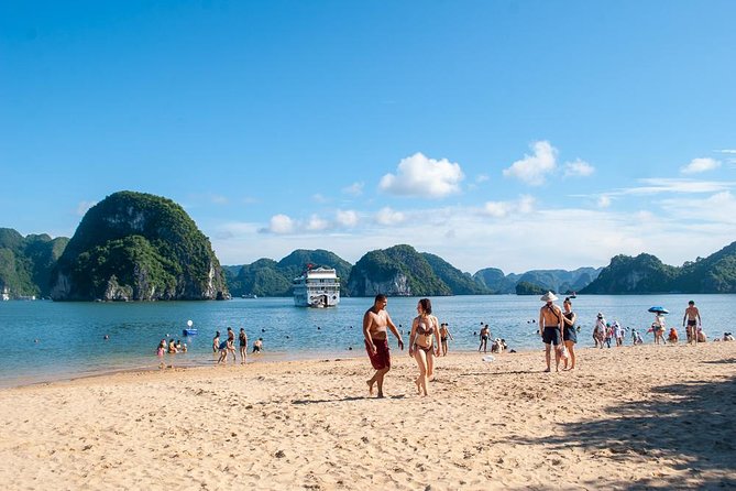 Halong Bay Day Tour With Titop Island, Cave, Kayak & Lunch - Titop Island: 400 Steps for Photos or Beach Time for Recovery