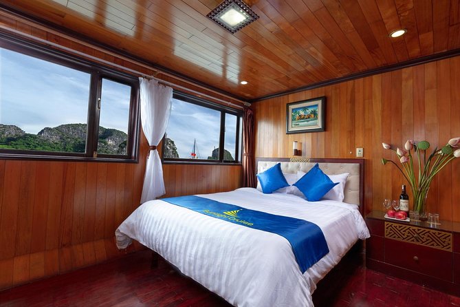Halong bay deluxe cruise 2 days/ 1 night: kayaking, titop island, surprise cave - Titop Island Time: Swim, Or Climb for the Big Views