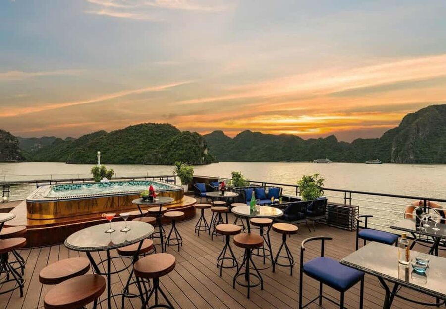 Hanoi: 2-Day Ha Long & Lan Ha Bay 5-Star Boat with Balcony - The sundeck sunset party, cooking class, and nighttime fun