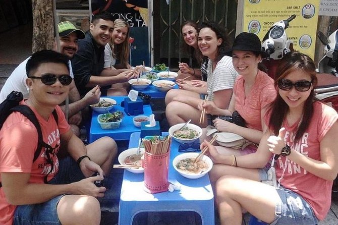 Hanoi City Street Food Night Tour by Motorscooter - The landmark loop: Hoan Kiem, Dong Xuan, and French-era highlights