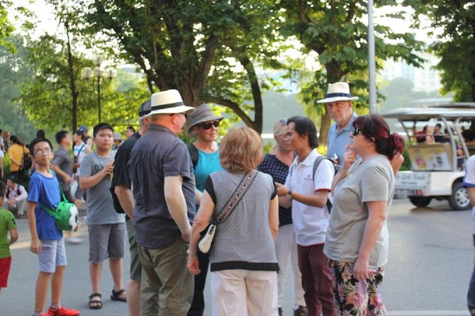 Hanoi City Street Food Night Tour by Motorscooter - Group size and the role of the guide (including named examples)