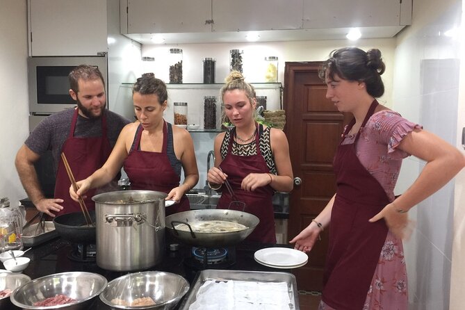 Hanoi Cooking Class and Market Tour in Ancient House - Hands-on cooking four traditional dishes, not one demo