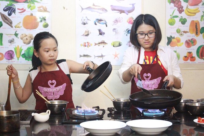 Hanoi Cooking Class and Market Tour in Ancient House - The food table: tasting, wine or beer, and fruit after the meal