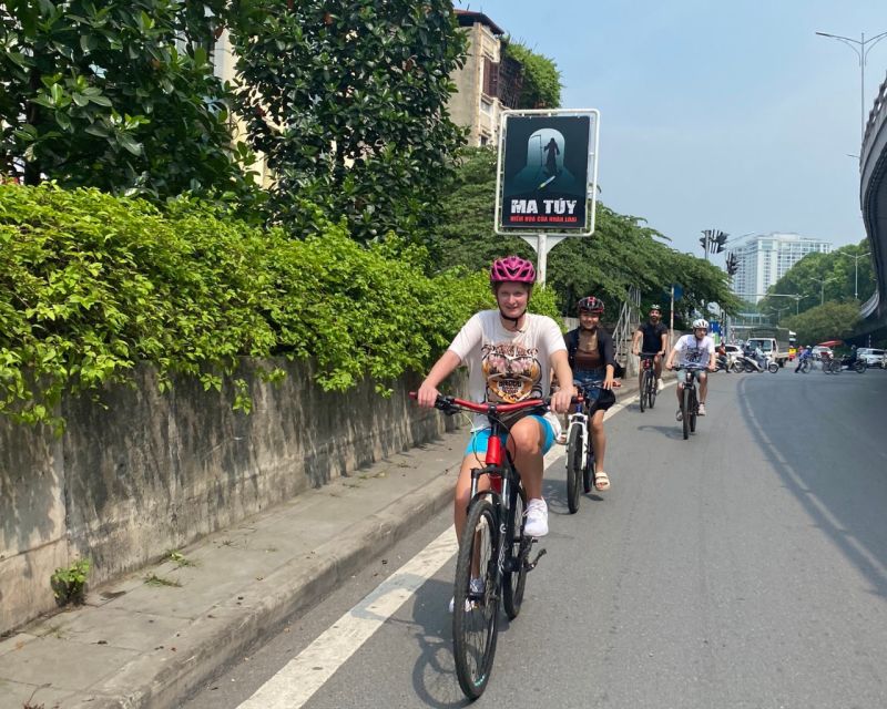 Hanoi Countryside Bicycle Tour - Long Bien Bridge vs a small boat crossing to save distance