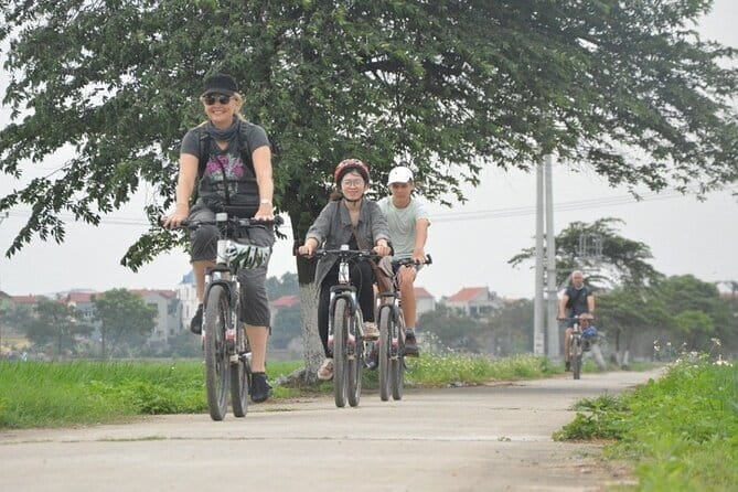Hanoi Countryside By Bike & Local House and Food Tasting - Long Bien Bridge and the first taste of river life