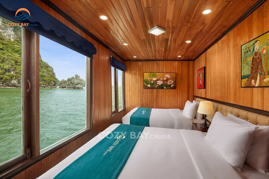 Hanoi: Cozy Halong Bay Overnight Cruise with Meals - Day 2: sunrise on deck, pearl farm learning, and kayaking your own way