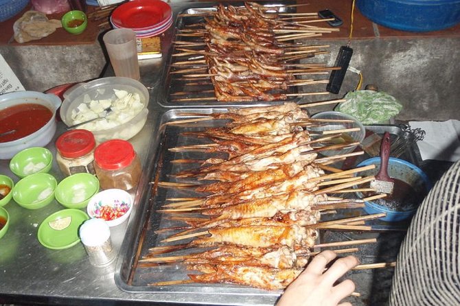 Hanoi Food on Foot: Walking Tour of Hanoi Old Quarter - Stop Two Energy: Market Trades, Hawkers, and Eat-As-You-Go Plates