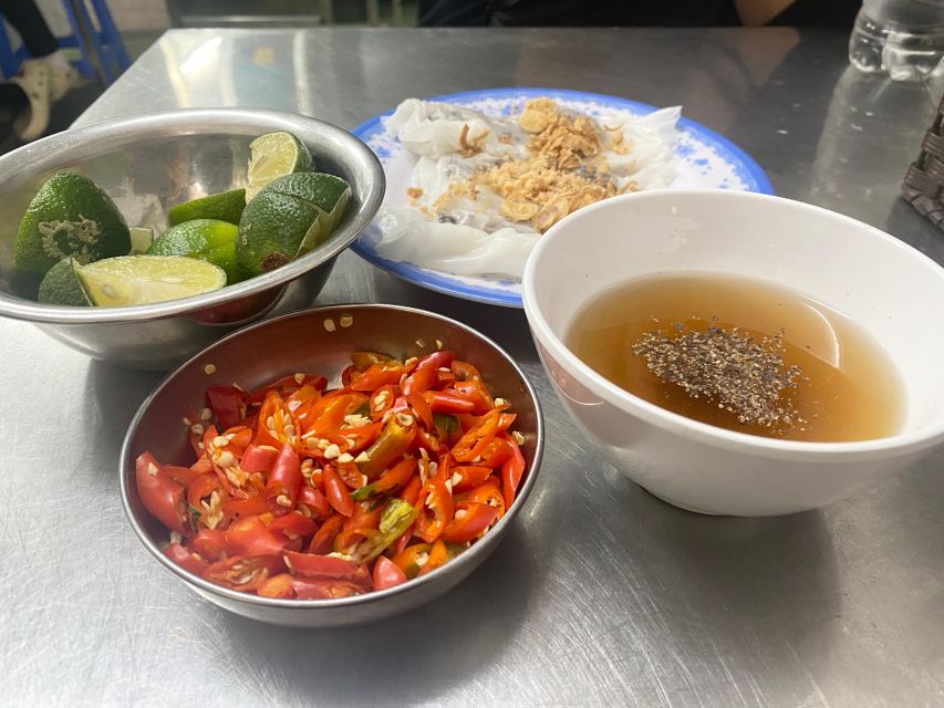 Hanoi: Guided Street Food Tour with Train Street Experience - Train Street dinner theater, the inches-away moment