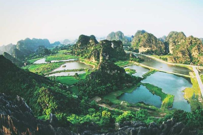 Hanoi - Hoa Lu - Tam Coc - Mua Cave - 1 Day Tour. By Luxury Limousine From Hanoi - Tam Coc boat trip through three caves: the pace is slow, the scenery is not