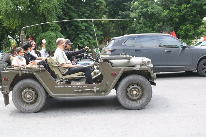 Hanoi Jeep City Tour combine Countryside Train Street, Hidden Gem - Lunch, Entrance Fees, Water, and Rain Ponchos: The Value at $53