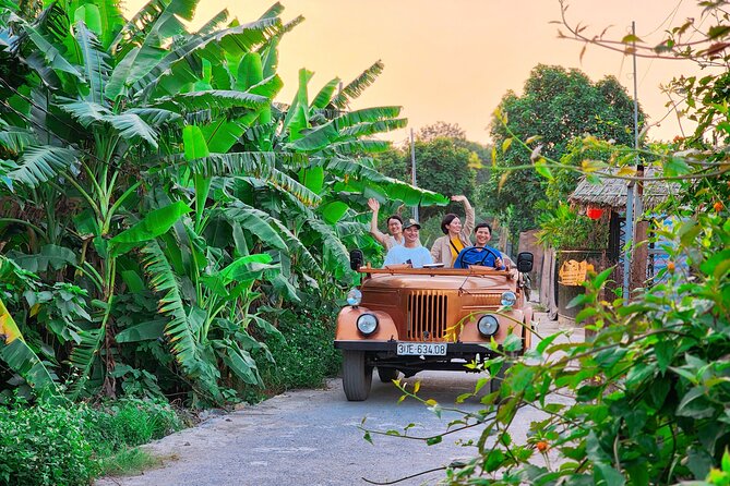 Hanoi Jeep Tour: Red River Countryside+ Backstreet+ Train-street - Bay Mau Lake backstreets: where you slow down and notice real homes