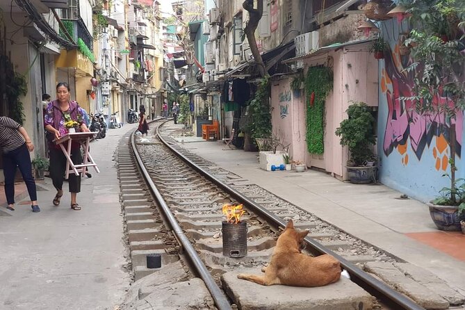 Hanoi Jeep Tour: Train-street, Highlights and Hidden Gems - Long Bien Bridge views, the best kind of photo break