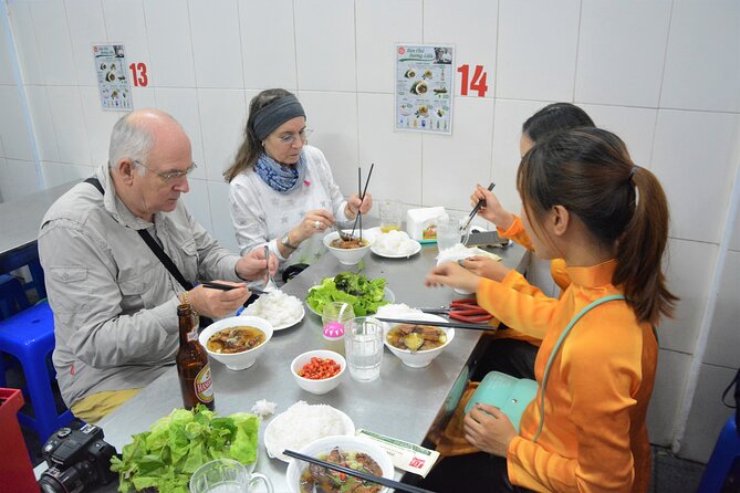 Hanoi Jeep Tours Led By Women: City & Red River Half Day - Duờng Tau and Train Street lunch next to the tracks