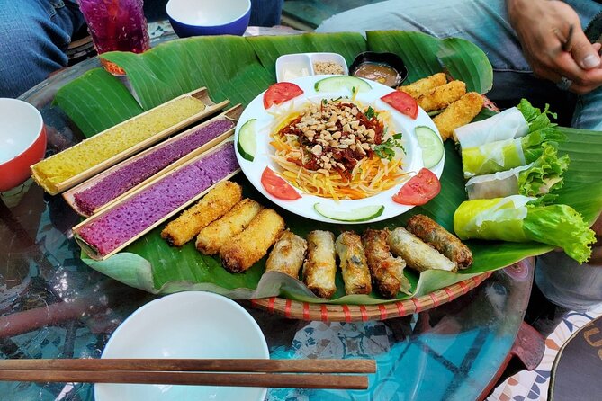 Hanoi Michelin Star Walking Food Tour & Train Street - Stop 1: Bach Ma Temple, history with practical city context