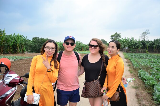 Hanoi Motorbike Led By Women: Hanoi Countryside Motorbike Tours - Long Bien Bridge to a village home: rice life plus bonsai and tea