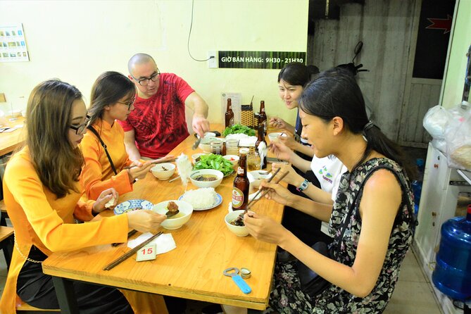 Hanoi Motorbike Tour Led By Women: Hanoi Motorbike Food Tours - Ngõ 224 Lê Duẩn and Train Street life: people using the tracks daily