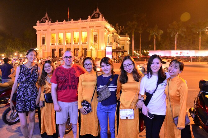 Hanoi Motorbike Tour Led By Women: Hanoi Motorbike Food Tours - Hồ Trúc Bạch West Lake evening photos and a brief ceremony moment