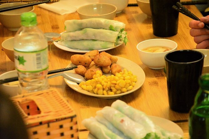 Hanoi Motorbike Tours Led By Women: Hanoi By Night Foodie Motorbike Tours - Long Bien Bridge and bun cha: the family-restaurant style stop