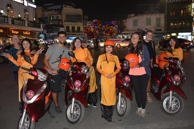 Hanoi Motorbike Tours Led By Women: Hanoi By Night Foodie Motorbike Tours - Passing Ho Chi Minh Memorial at night and then heading for egg coffee