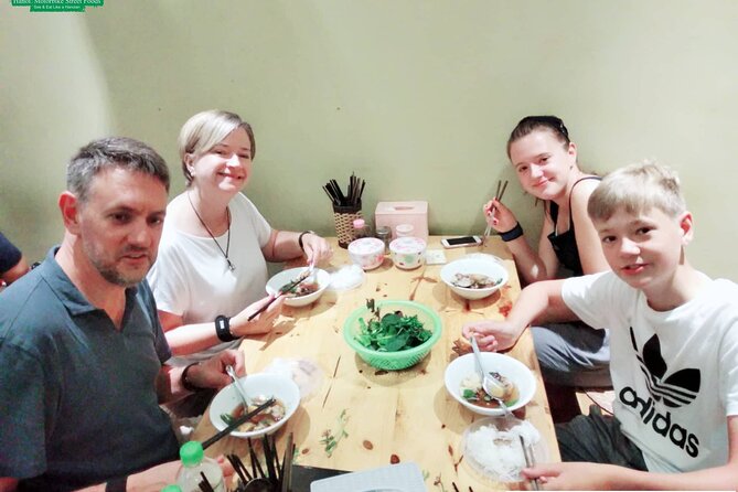 Hanoi Nightlife Food Tour By Motorbikes - Hour-by-hour: Old Quarter street-food start, West Lake ride, and Long Bien Bridge photos