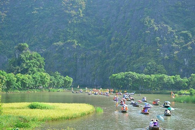 Hanoi - Ninh Binh Day Trip - Trang An boat ride: sampan through hidden caves with a local guide