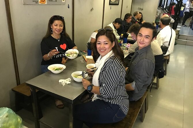 Hanoi Sightseeing & Food Tour by Scooter with Train Street - Old City Gate, Dong Xuan Market Pass-By, and the Flag Tower Stop