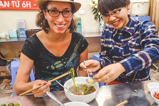 Hanoi Street Food Tour - Best Price - Eating as you walk: fruit, fries, noodles, and the things you won’t pick yourself
