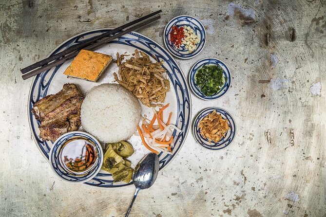 Hanoi Street Food Tour By Motorbike + Sightseeing SAFE & FUN - Oc Di Tu Seafood and West Lake views: tasting and taking in the scenery