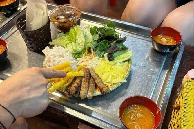 Hanoi Street Food Tour with egg coffee making - Nem ran, pho rolls, and the herb and crunch contrast