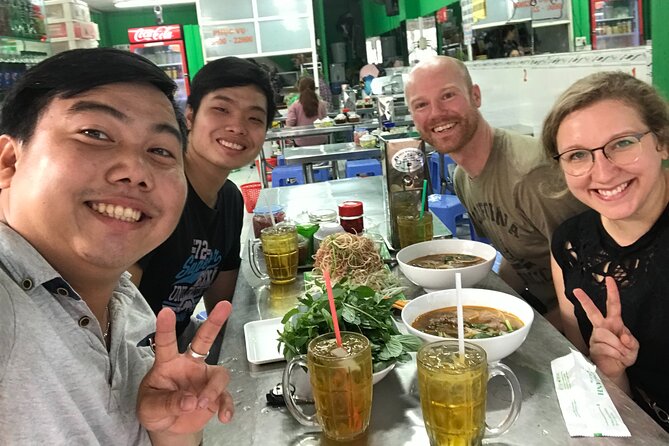 HCM City Local Street Food by scooter/ Aodai Rider Saigon tour - Market stops that tell you how Saigon really works