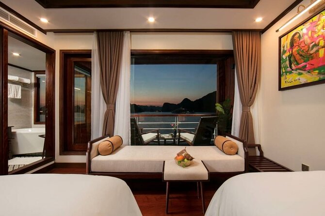 Heritage Cruises Best Luxury Cruise to Halong and Lan Ha Bay 2D1N - Activities and pacing: cave, kayaking, squid fishing, and cultural extras