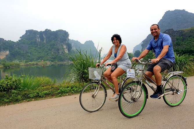 Highlight Ninh Binh Full Day Tour Tam Coc Boat, Mua Cave, Hoa Lu - Tam Coc by bamboo boat: the calm part of the day
