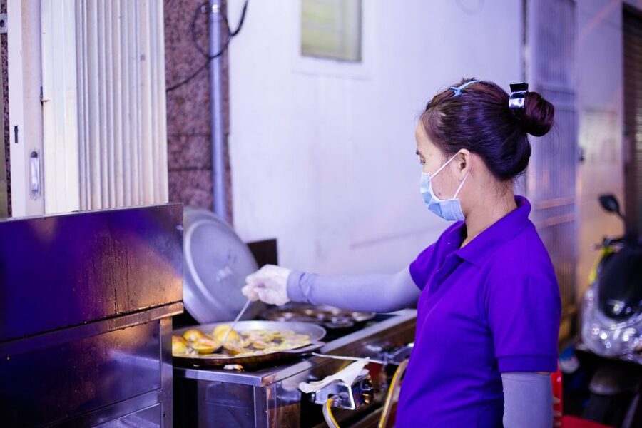 Ho Chi Minh City: Private Street Food Motorbike Tour - Old buildings, a pagoda tucked inside an apartment, and the city’s two faces