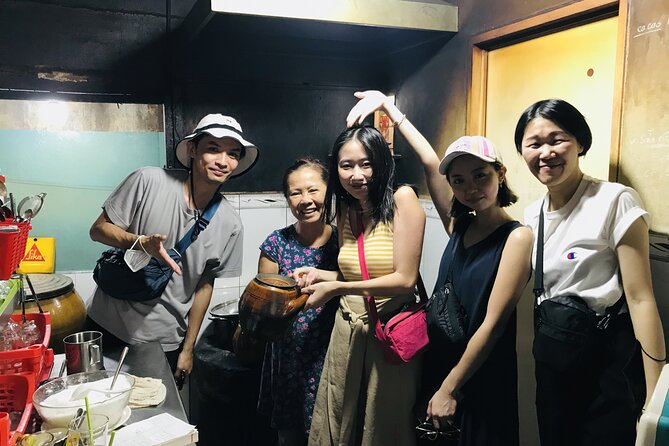 Ho Chi Minh City Signature Local Street Food by scooter Tour - Stop at the Nguyen Thien Thuat Apartment Buildings for everyday Saigon life