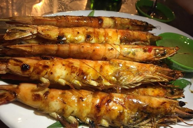 Ho Chi Minh City: Street Food Walking Tour with 12 Tastings - Why a 4-hour night loop is smart in Ho Chi Minh City