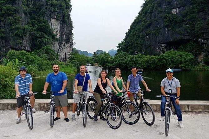 Hoa Lu - Tam Coc boat Trip and Mua Cave - Tam Coc boat trip: drifting through three caves like a moving postcard