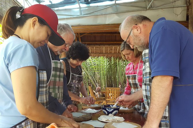 Hoi An Ancient Town And Countryside Tour Full Day - Hoi An Ancient Town Highlights: Bridges, House Names, and Chinese-Japanese Clues