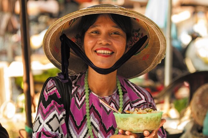 Hoi An at Sunset: Authentic Local Street Food Tour - Cao lau noodles and the peanut sesame hot milk moment