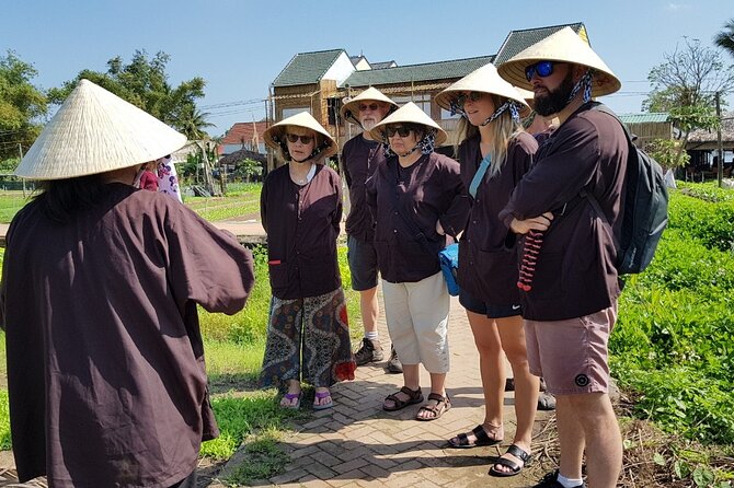 Hoi An Cooking Class With Market Tour and Bamboo Basket Boat Ride - Tra Que Village Cooking School: Garden Views and a Welcome Drink