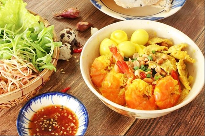 Hoi An Street Food Tour- The Real Taste Of Hoi An - Stop 4: Cơm Gà at Ba Buội, the chicken rice that anchors the meal