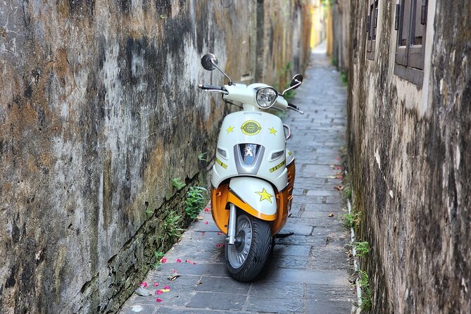 Hoi An Vespa Tours: Hoi An Highlights and Hidden Gems - Stop 1: Hoi An Ancient Town on two wheels